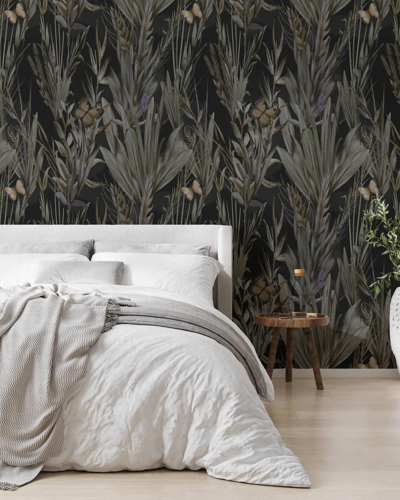 Dramatic bedroom showcasing moody botanical wallpaper with exotic leaves and butterfly accents in rich black tones, ideal for luxurious retreats