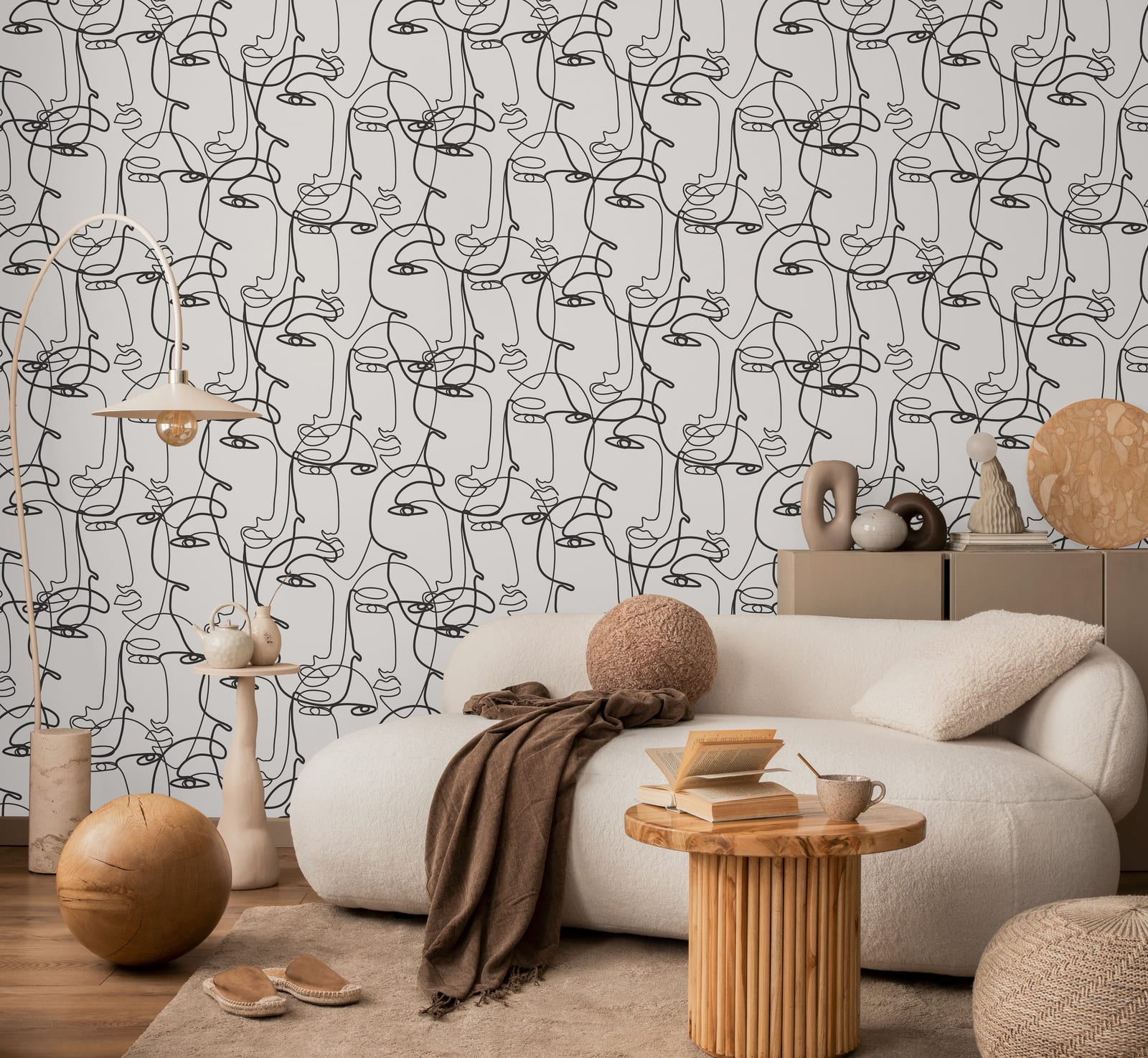 Elegant home interior decorated with abstract continuous portrait line artwork wall design forming statement feature background inside contemporary living room