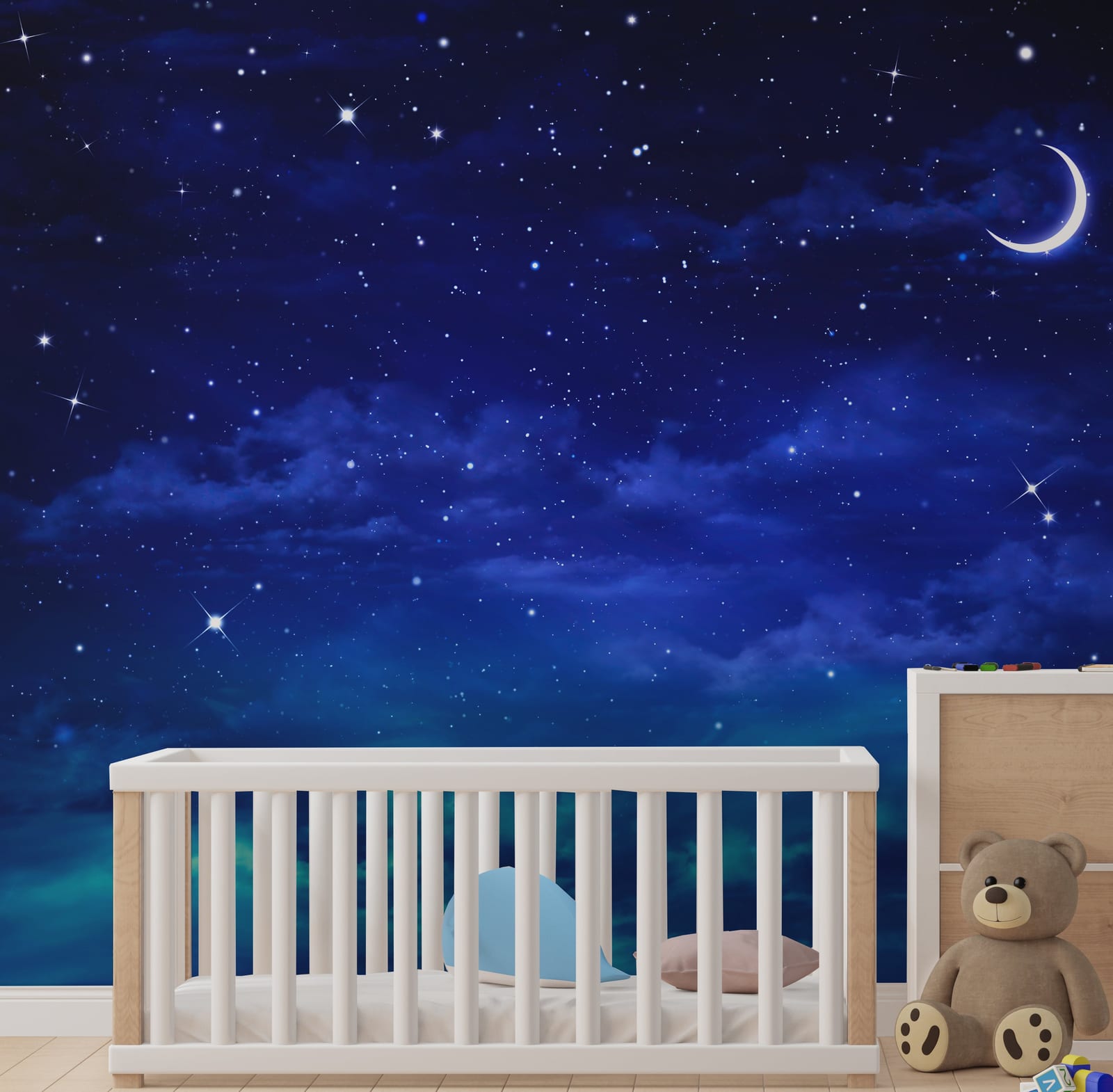 Starry night sky wallpaper mural installed on kids bedroom accent wall inspiring bedtime imagination