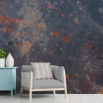 Living room with wooden table, lamps and pink armchair. High-impact removable rust mural wallpaper for entryways in Chicago lofts, featuring burnt orange metal patina, perfect for textured modern wall styling in Windy City interiors.