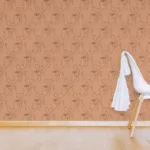 Minimalist line art wallpaper featuring abstract face drawings in burnt brown for modern New York homes.