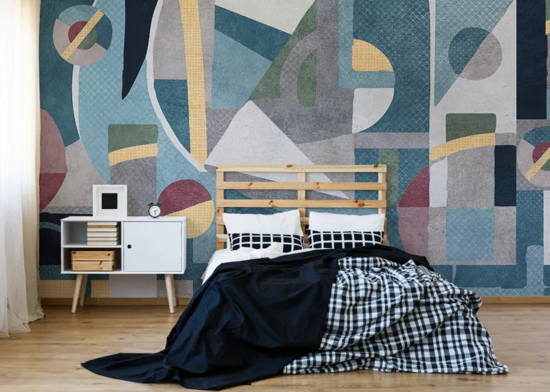 Peel and stick modern wallpaper with abstract geometric blue art style, creating a bold accent feature wall for contemporary Chicago homes.