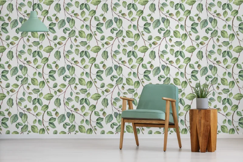 Peaceful botanical greenery vinyl wall mural adored in Los Angeles interiors, easy to remove, creating a soft nature-inspired wall art for calm modern homes.