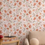 Soft orange lily botanical peel and stick wallpaper creating a warm stylish room interior with elegant floral detailing for modern home decoration.