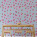 Soft floral accent wallpaper with blue and pink patterns for modern homes, offering a cozy removable cottage bedroom design for elegant interiors.